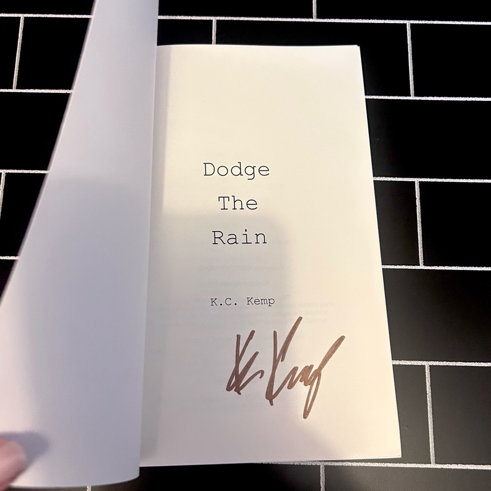 Signed 'Dodge The Rain' Book